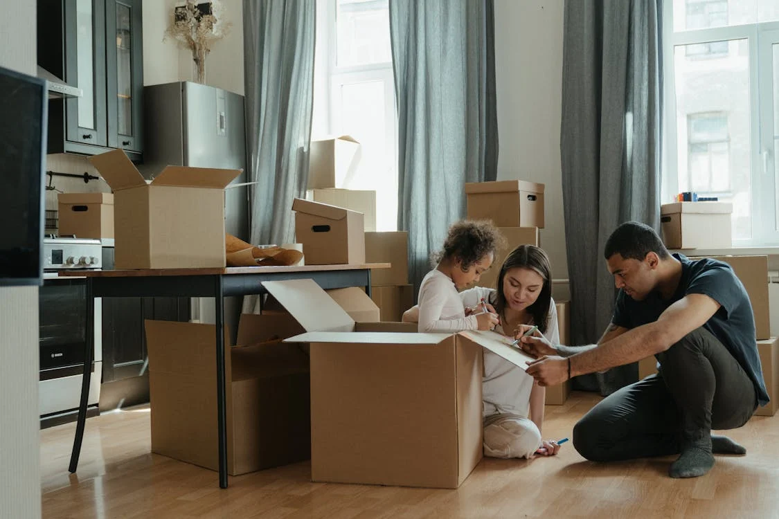 A family unpacking after a move